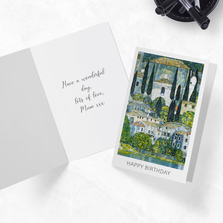 Evanescent Visions art greeting cards laying on a desk with pens