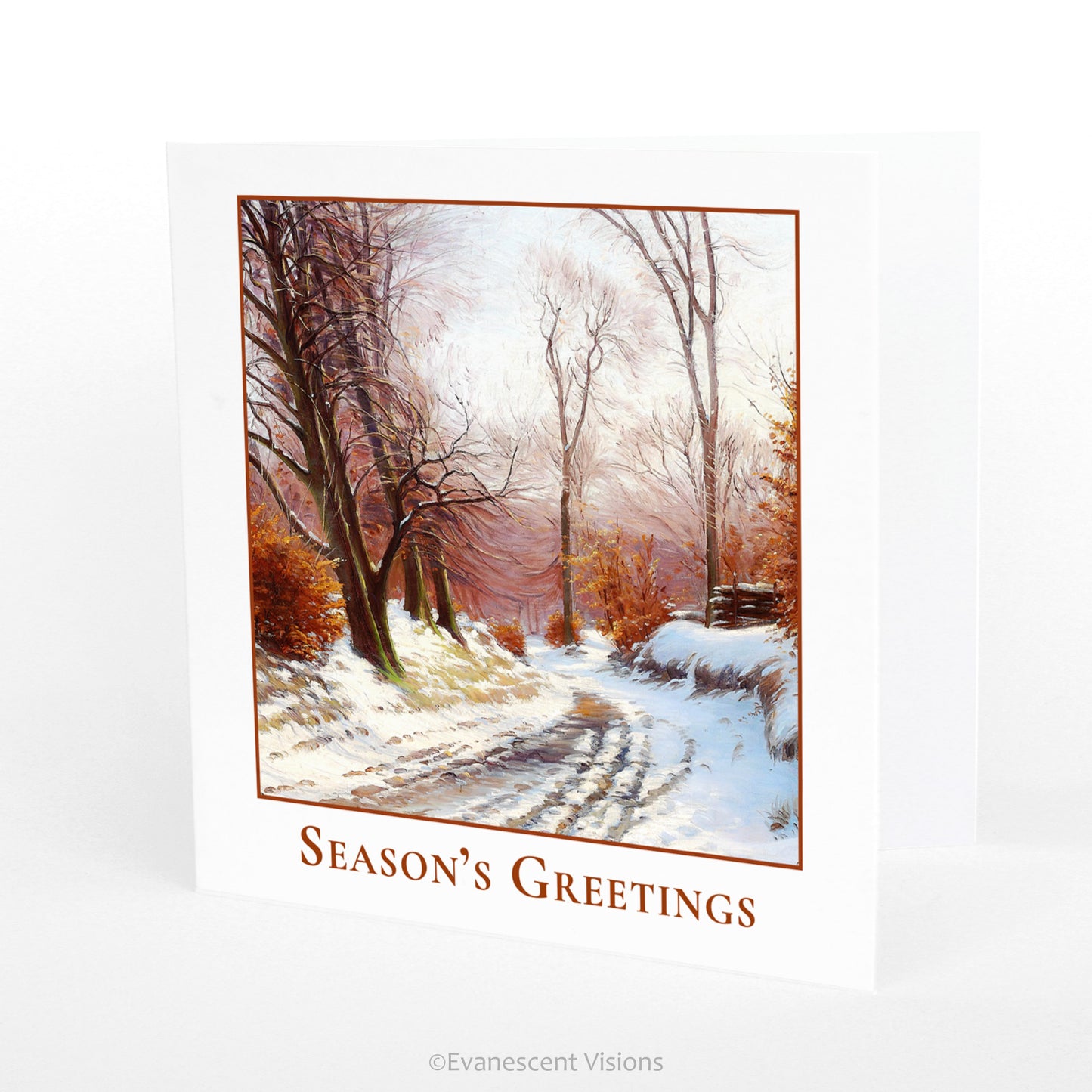 Winter Road Season's Greetings Traditional Christmas Card with artwork 'The Road to Ørholm' by Sigvard Hansen, with the card standing on a table.