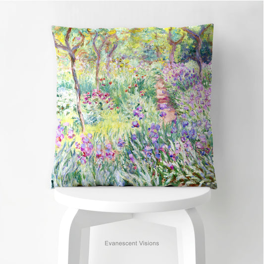 A square decorative cushion featuring an impressionist floral artwork 'The Artist's Garden' by Claude Monet, on stool.