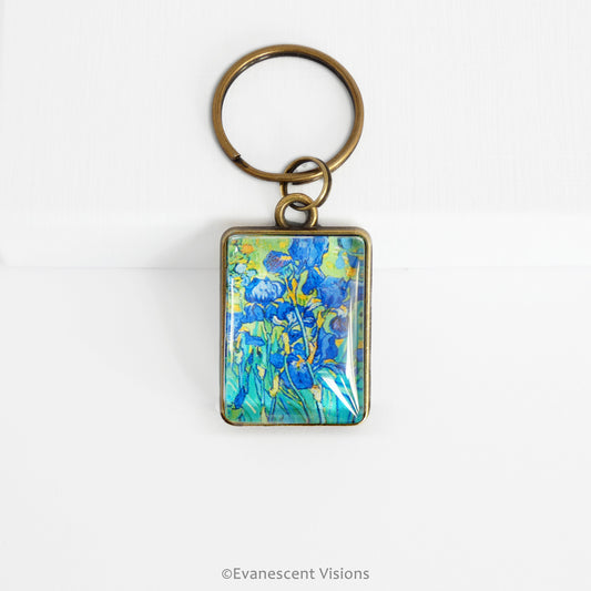 Metal keyring with Van Gogh Irises artwork capped with a glass cabochon.
