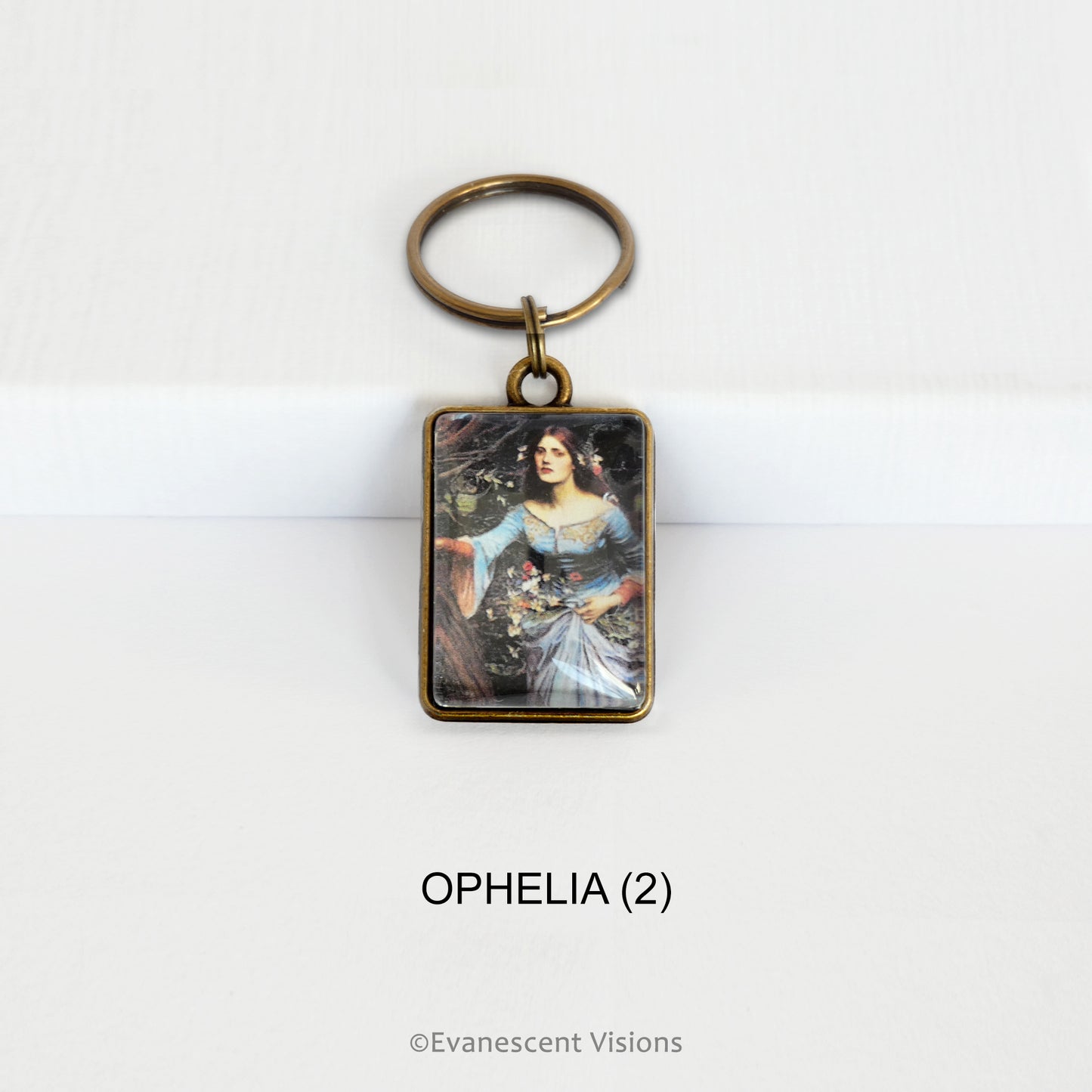 Pre-Raphaelite art keyring with artwork 'Ophelia' by John William Waterhouse, on a white background