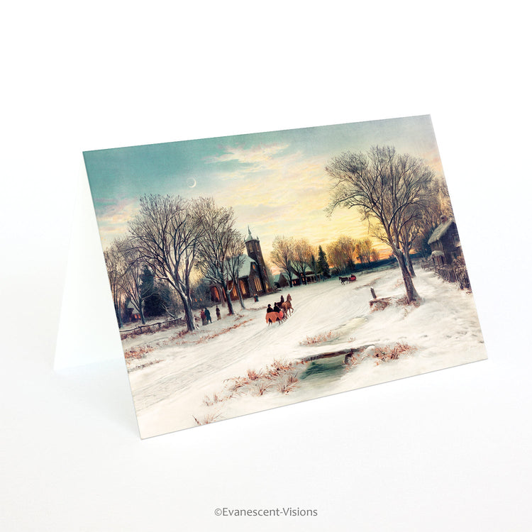An Evanescent Visions fine art Christmas card with a winter scene standing on a table