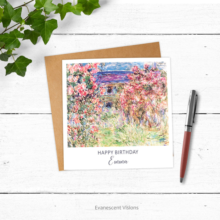 An Evanescent Visions personalised birthday greeting card on a wood surface with a pen and plants