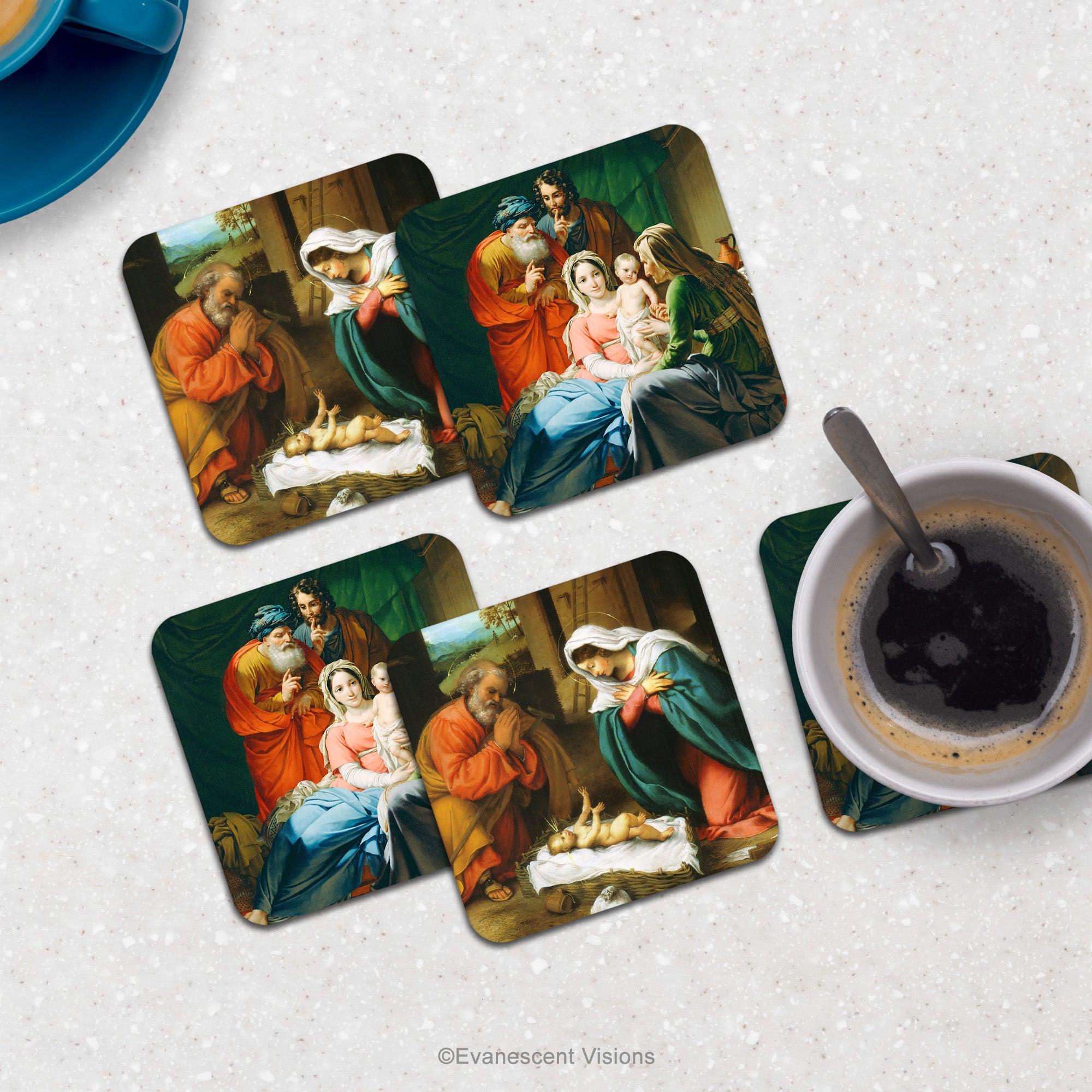 Set of 4 square Christmas coasters with scenes of the Nativity from paintings by  by Joseph Paelinck and Lorenzo Lotto, shown on a marble  Counter top with drinks .