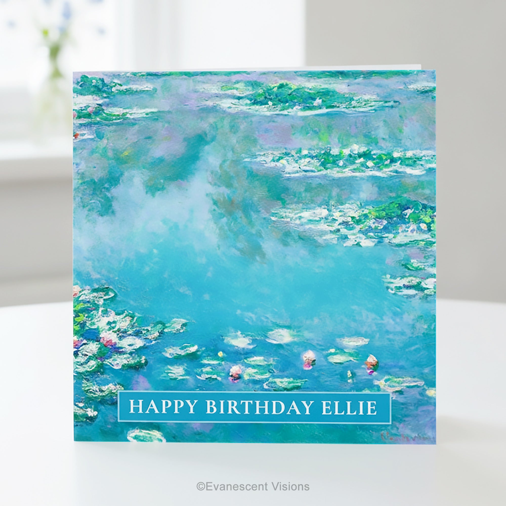 A square greeting card featuring Claude Monet Water Impressionist Water Lilies Painting standing upright on a table. 
