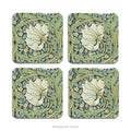 Set of 4 coasters with detail from design 'Pimpernel' by William Morris, on a white background
