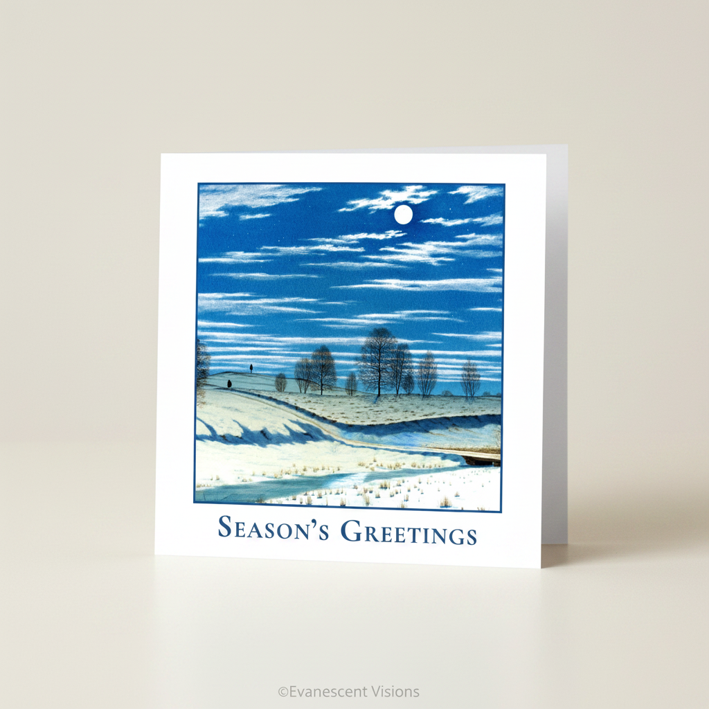 Winter Moonlight Season's Greetings Traditional Christmas Card on a white surface.