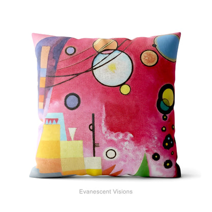 A colourful square cushion featuring an abstract art print of Schweres Rot (Heavy Red) by abstract artist Wassily Kandinsky, shown on a white background
