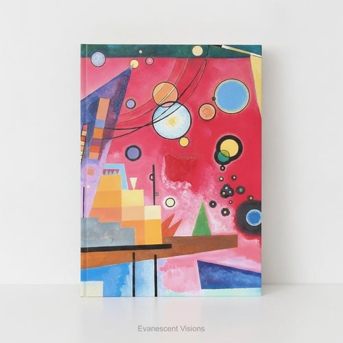 A hardcover notebook with a cover featuring  a colorful abstract geometric design titled 'Schweres Rot' by Kandinsky, shown on a white background. 