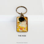 Keychain with 'The Kiss' design by Gustav Klimt on a white background