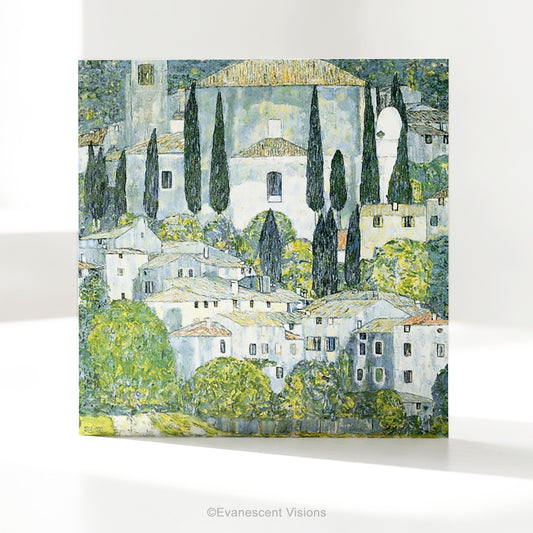 A square art greeting card on a table  featuring Gustav Klimt impressionistic painting 'Church at Cassone' a village scene with white buildings, green trees, and blue-gray sky.