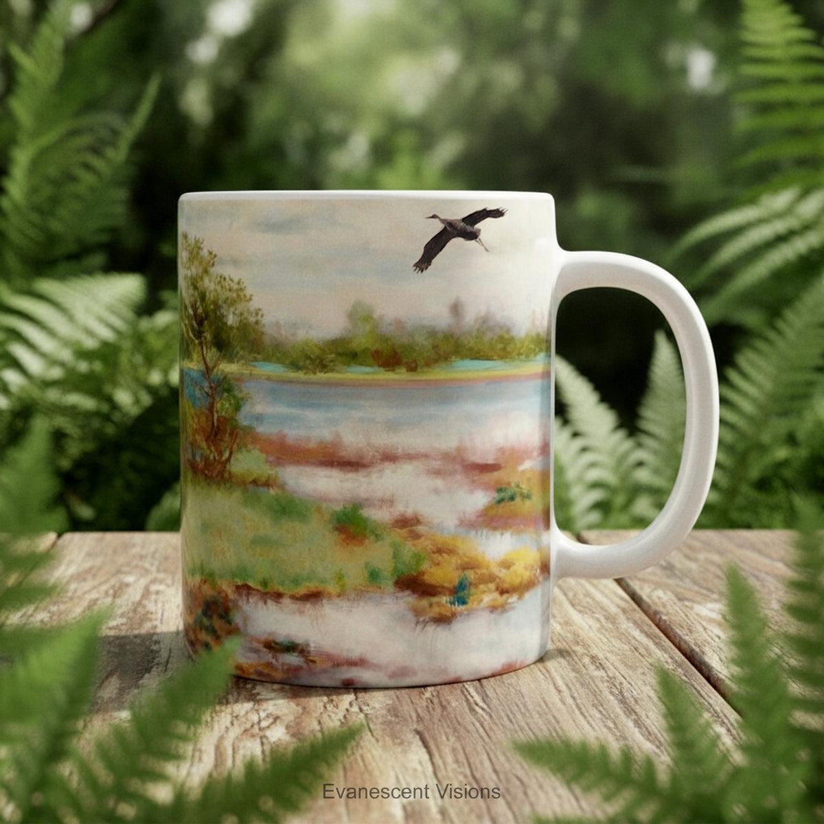Ceramic mug featuring painting Landscape With Cranes at the Water' on a wood table.