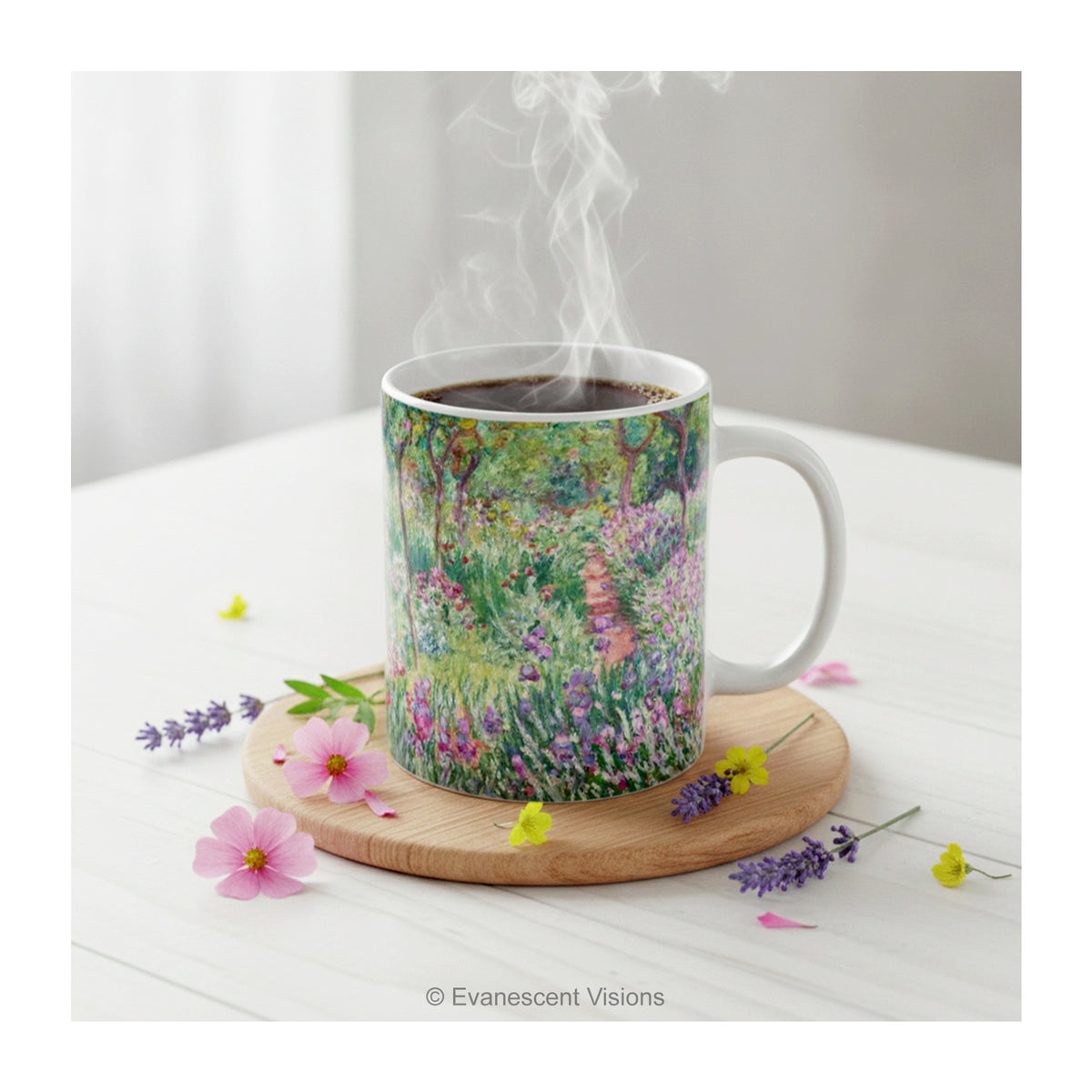 The Artist's Garden at Giverney' ceramic mug styled on a table with wildflowers