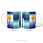 Left and right side views of a ceramic mug featuring a watercolor-style abstract landscape print called 'Harbinger of Autumn' by Paul Klee