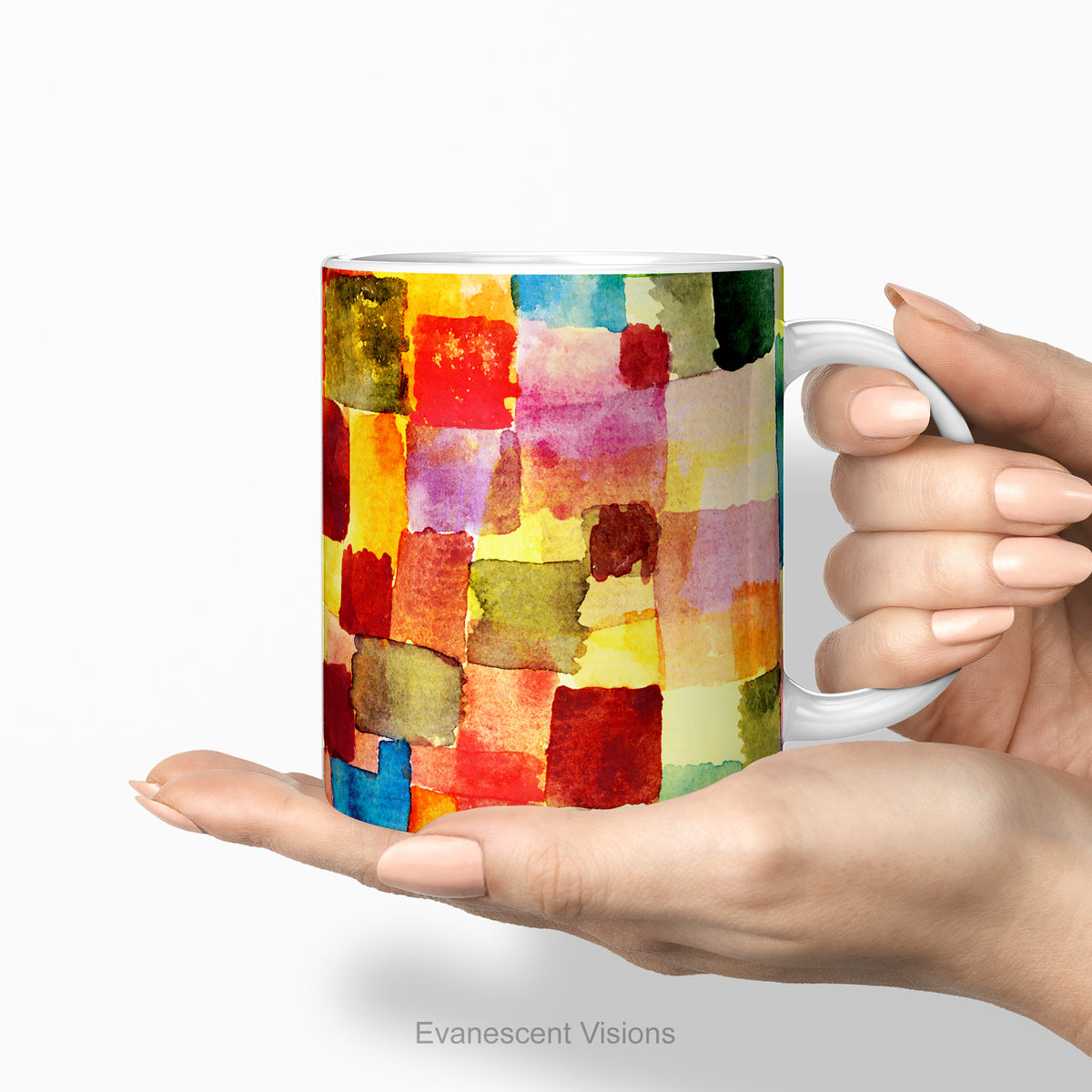 Hands holding a ceramic mug featuring abstract watercolor design titled 'Untitled' by artist Paul Klee