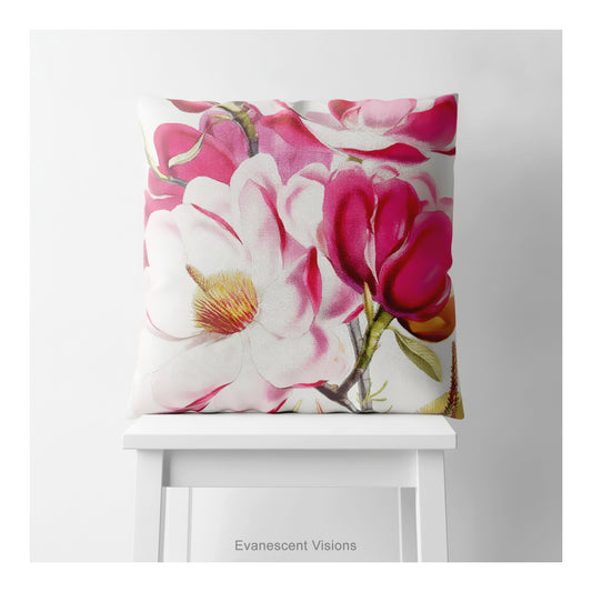 A square cushion featuring a watercolor-style floral print of magnolia blossoms  artwork by Walter Hood Fitch, shown on a white stool.