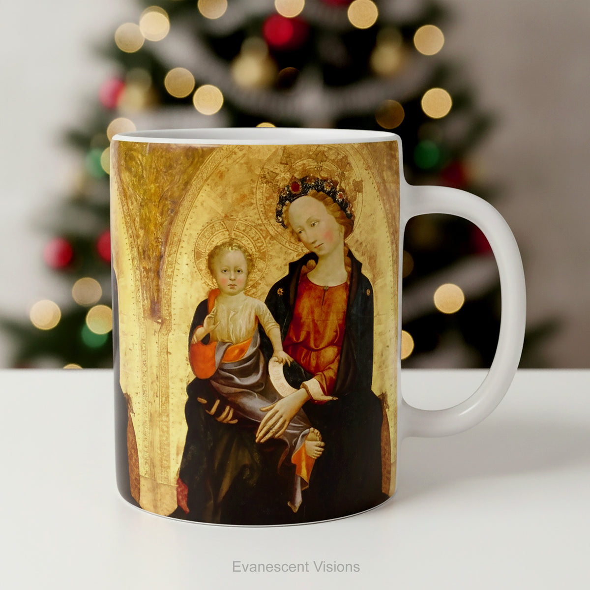 Ceramic mug with a print of Renaissance painting 'Madonna and Child', styled on a table. 