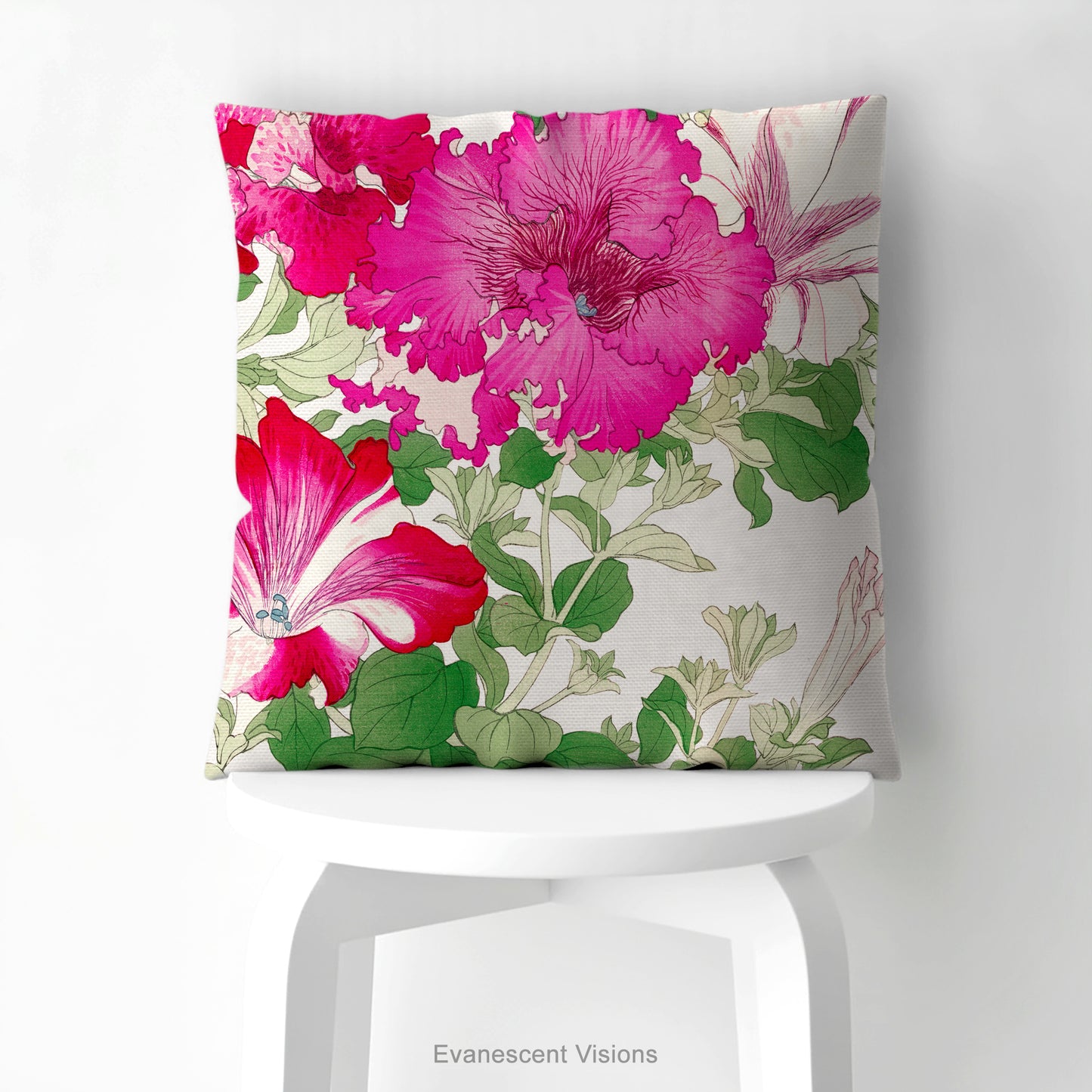 A square pillow with a vibrant floral print  of Vintage petunia flowers  by artist Tanigami Kônan, shown on a white stool.