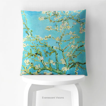 A square decorative cushion featuring Vincent van Gogh's 'Almond Blossom' painting design,  shown styled on a stool.