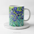 A ceramic mug featuring a print of artwork  'Irises' by Vincent Van Gogh.