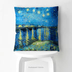 A square art cushion featuring Vincent van Gogh's 'Starry Night over the Rhone' painting' on a white stool. 