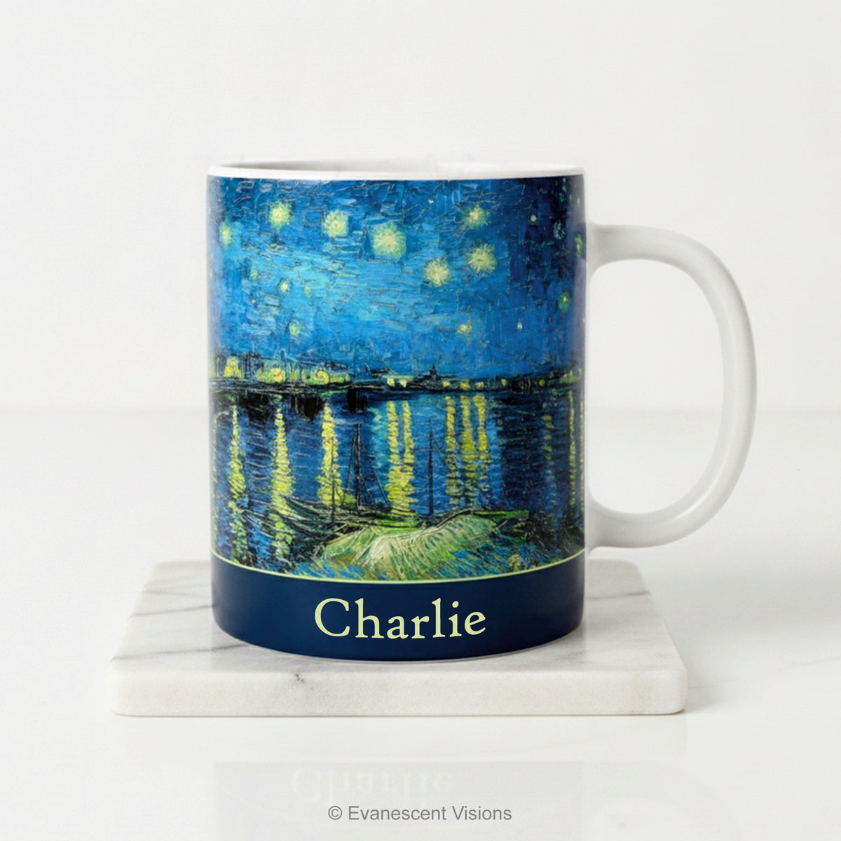 Ceramic mug with Van Gogh's painting Starry Night Over the Rhône, in blue and yellow tones, with a personalised name below. 