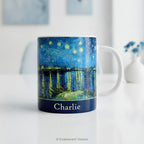 Starry Night Over the Rhône ceramic mug styled on a table.