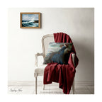 A decorative cushion featuring a print of the painting 'Miranda - The Tempest' by JW Waterhouse, shown on a classic chair with a red blanket.