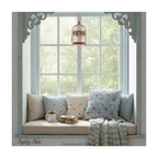 A square decorative cushion with red and blue floral  themed pattern entitled 'Snakeshead' by William Morris, on a window seat.