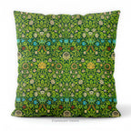 A square decorative cushion on a white background, featuring the floral pattern 'Violet and Columbine' by William Morris.