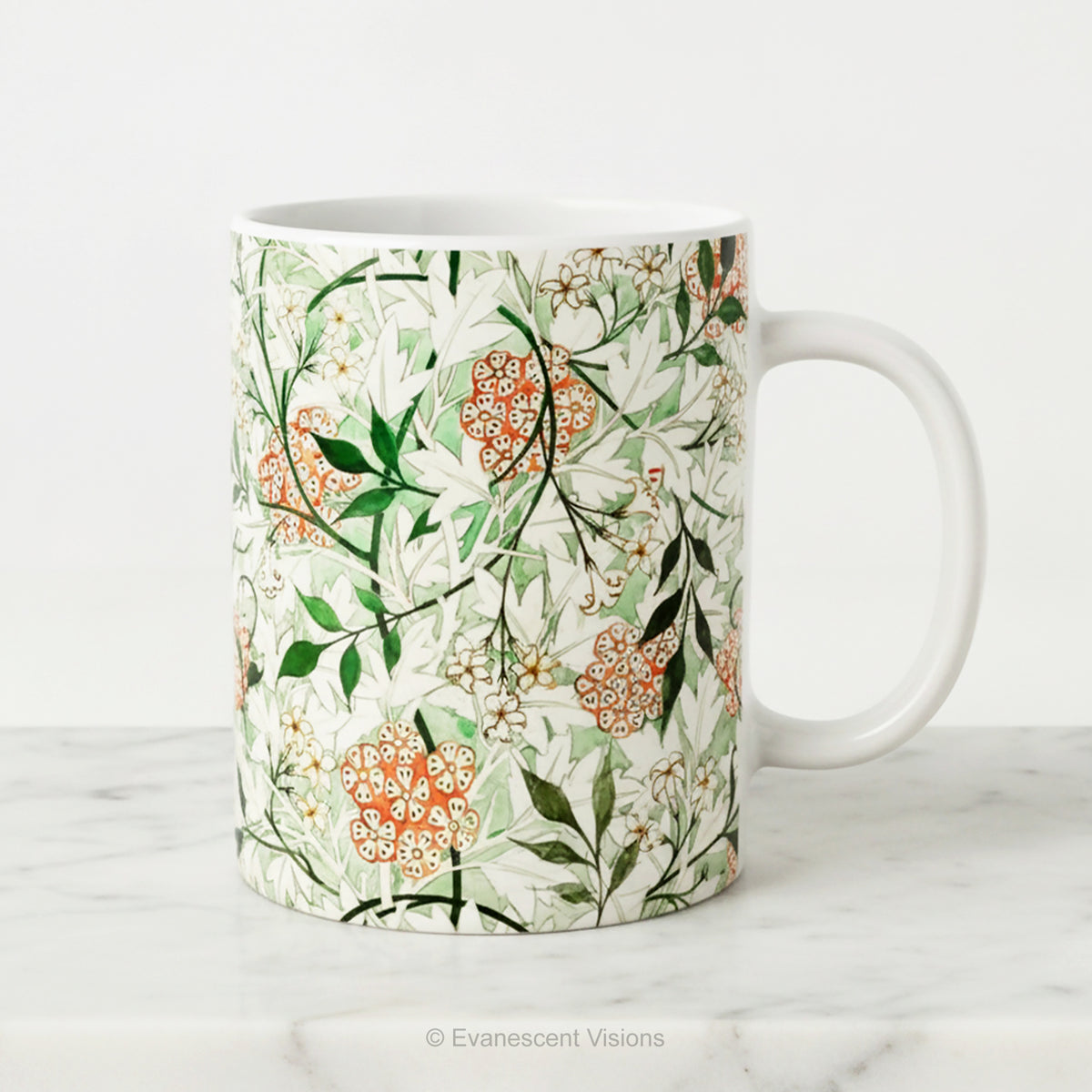 A ceramic mug featuring botanical pattern  'Jasmin'  by William Morris. on a white background.
