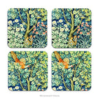 Set of four coasters printed with detail from the design  'Cock Pheasant' by William Morris, shown on a white background. 