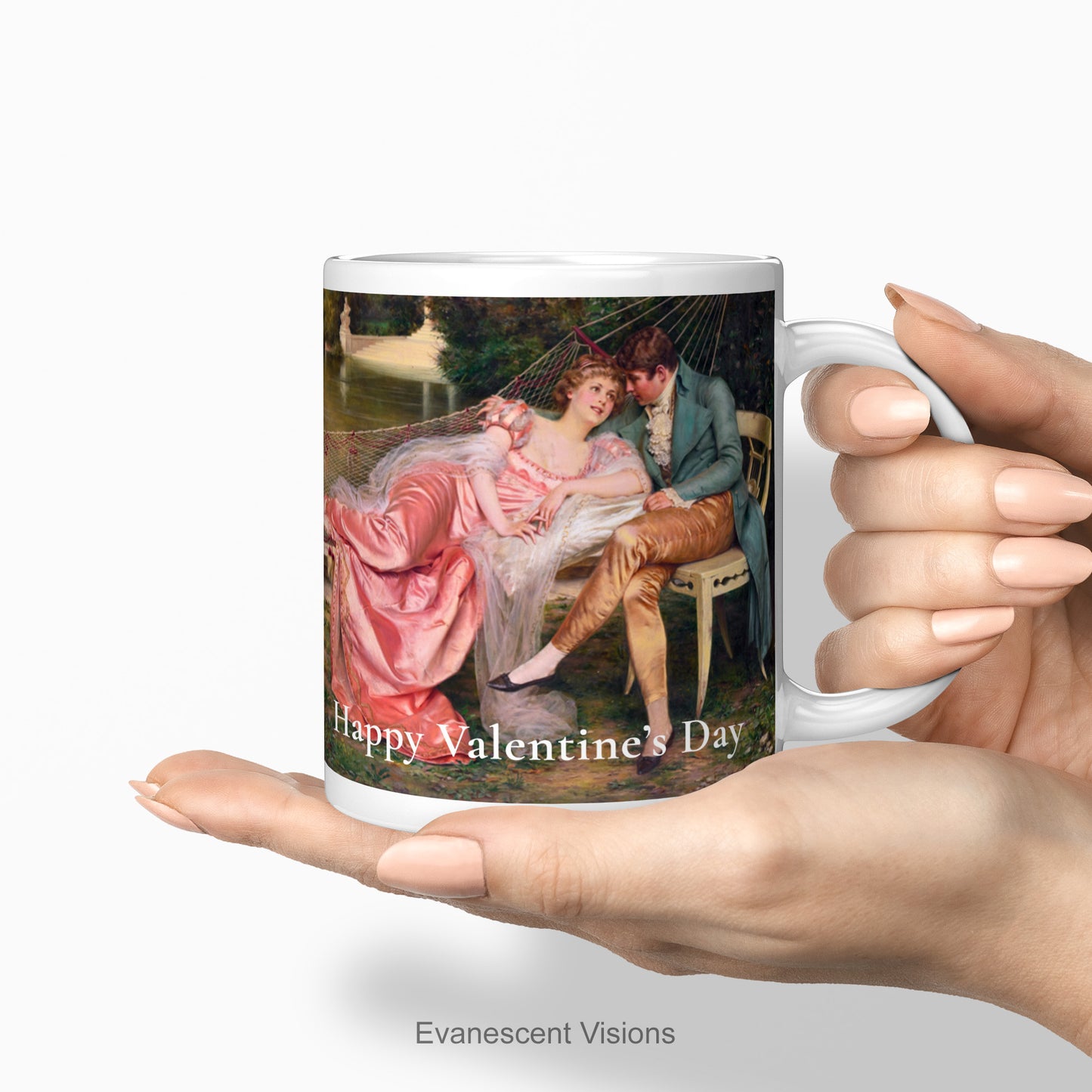 Personalised ceramic mug decorated with detail from painting 'During Day's Last Golden Rays' (aka 'The Flirtation') by Frédéric Soulacroix (1858-1933) shown being held in two hands